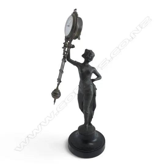 ART DECO STYLE BRONZED SPELTER MYSTERY CLOCK mounted to turned wood base, signature H.390mm