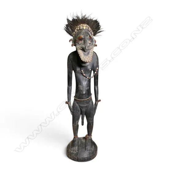 MINDIMBIT VILLAGE (PNG) CARVED WOODEN ANCESTRAL FIGURE WITH FEATHERED HEADDRESS/ COWRIE SHELLS & NECKLACE, H 750 X 180MM