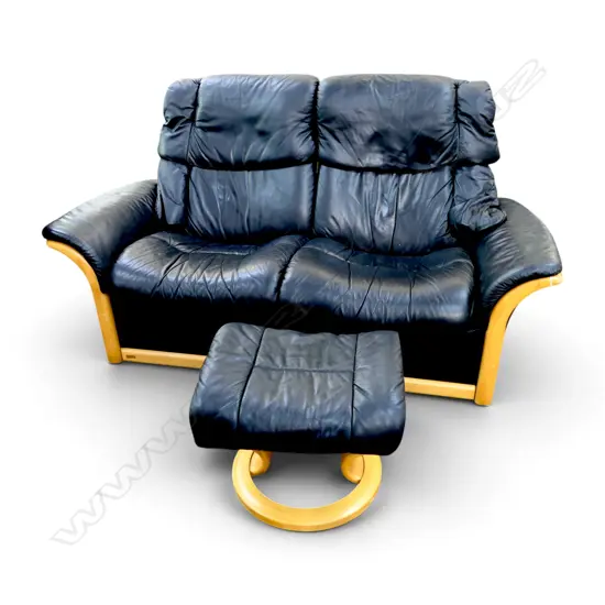 2 SEATER STRESSLESS RECLINER IN BLACK LEATHER + FOOTSTOOL