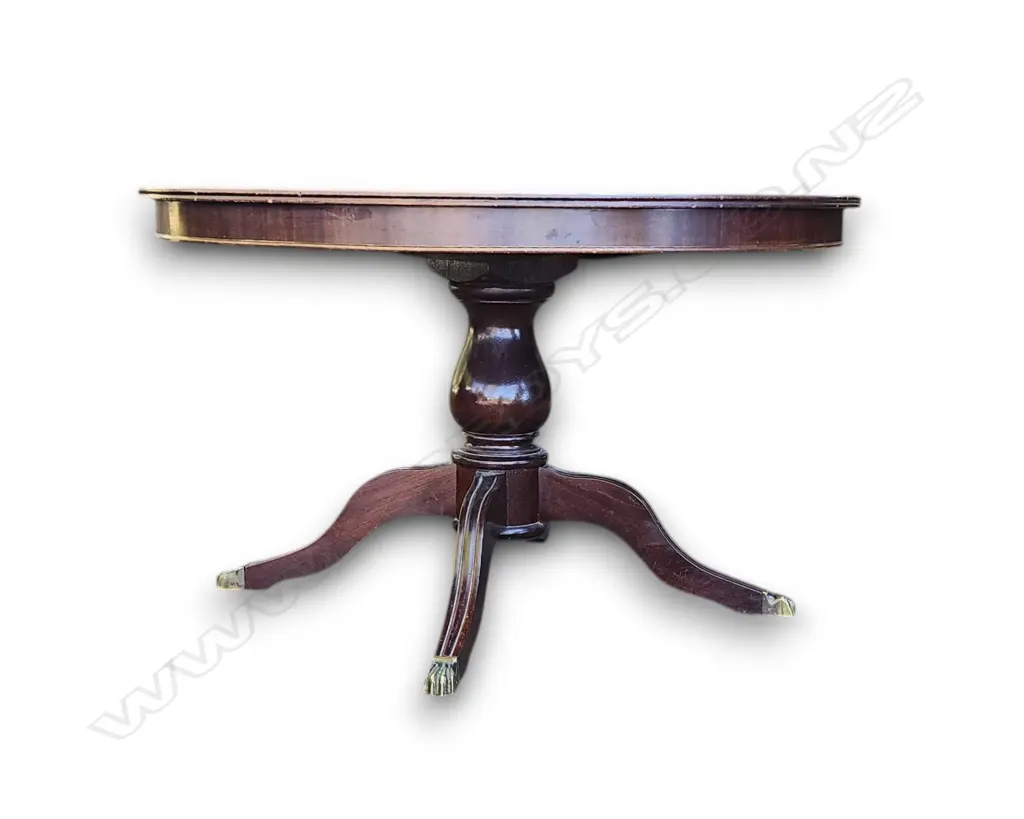 DINING TABLE W CARVED LEGS AND BRASS PAW-FOOT CASTERS Image 1++