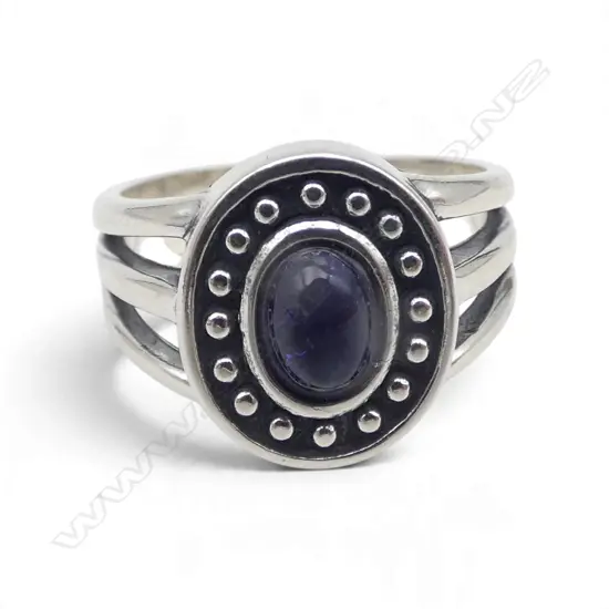 STG SILVER & TANZANITE RING 6.40gms SIZE O1/2