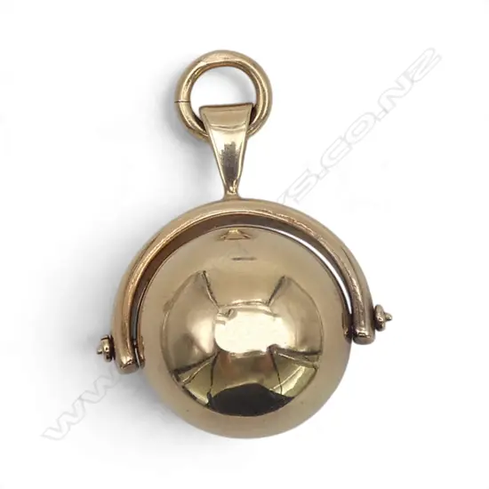 9ct GOLD SWIVEL BALL PENDANT, stamped 9 .375 D&K. 5.73gms