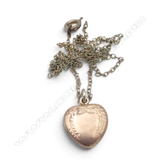 9ct HEART FORM LOCKET 1.50gms on plated chain