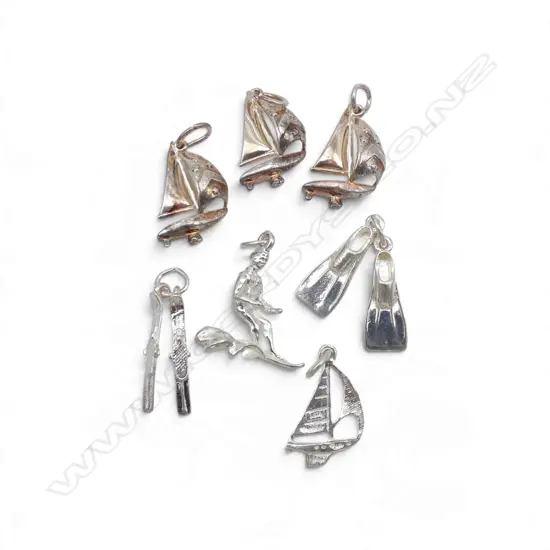 COLLECTION OF SILVER CHARMS 11.94gms