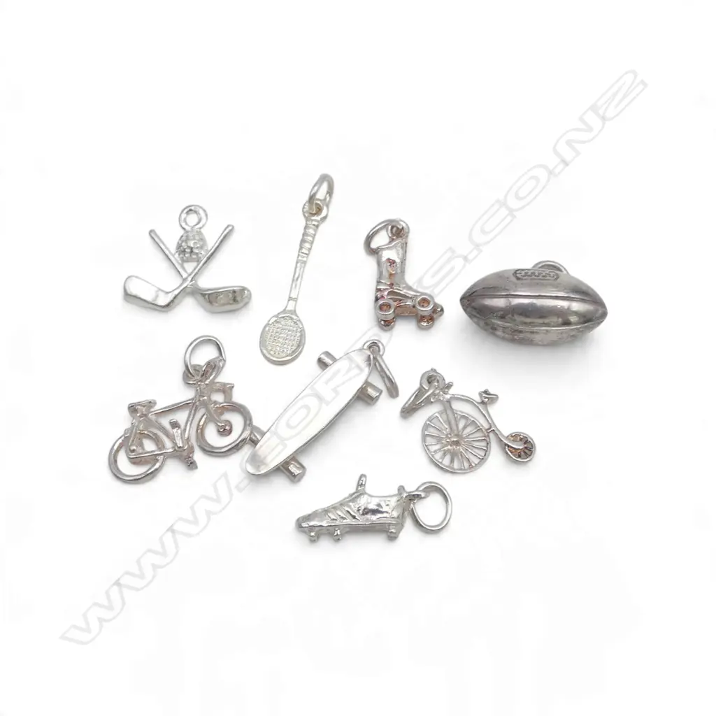 COLLECTION OF SILVER CHARMS 9.88gms Image 1++