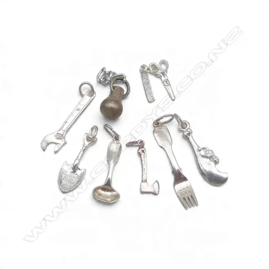 COLLECTION OF SILVER CHARMS 11.08gms