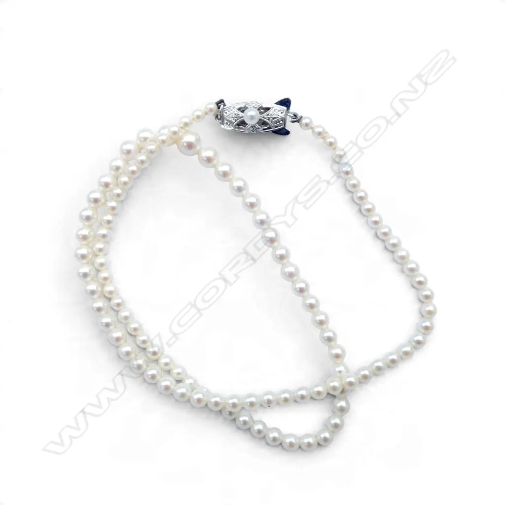 MIKIMOTO graduated CULTURED PEARL NECKLACE with bright lustre. Silver clasp with M (Mikimoto) mark. L.400mm Image 1++
