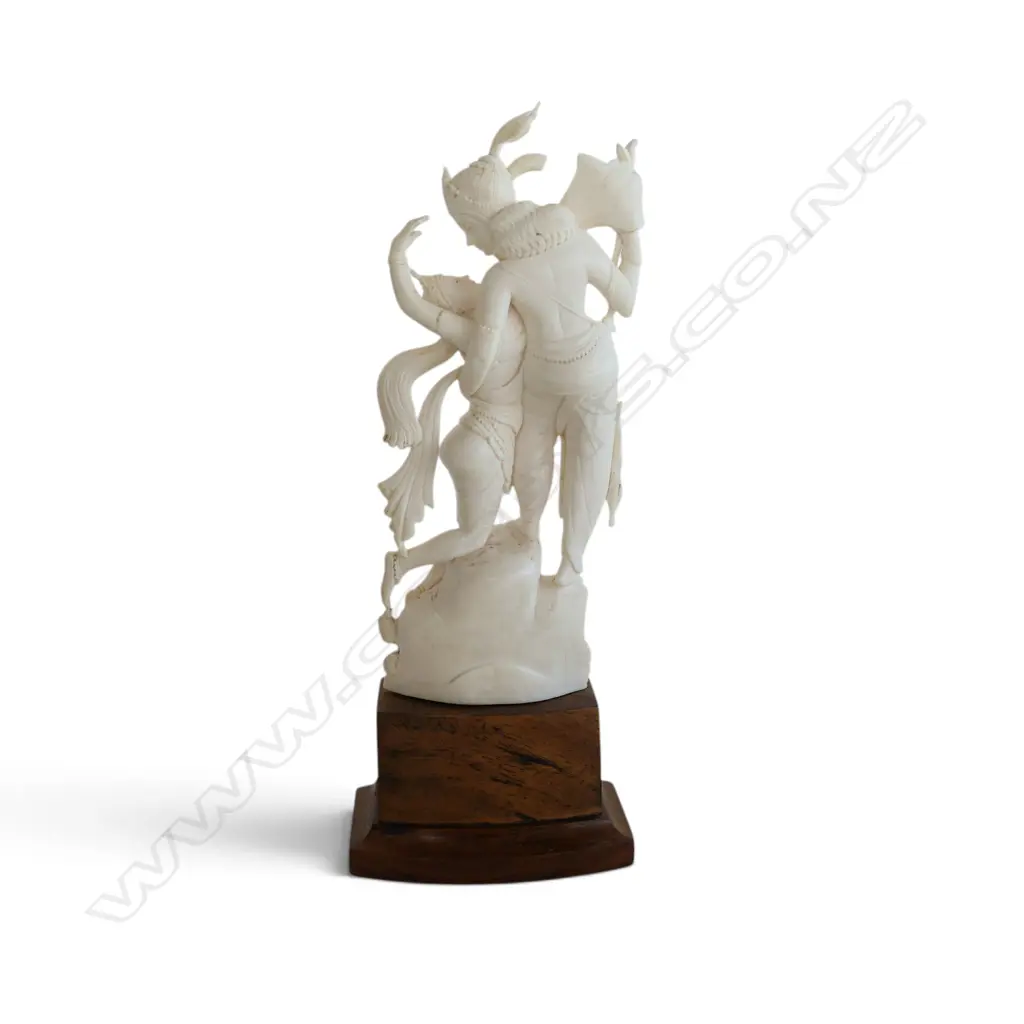 FINE VINTAGE INDIAN CARVED IVORY GROUP OF KRISHNA & RAHDA in an embrace. On wood stand. H.220mm. Image 1++