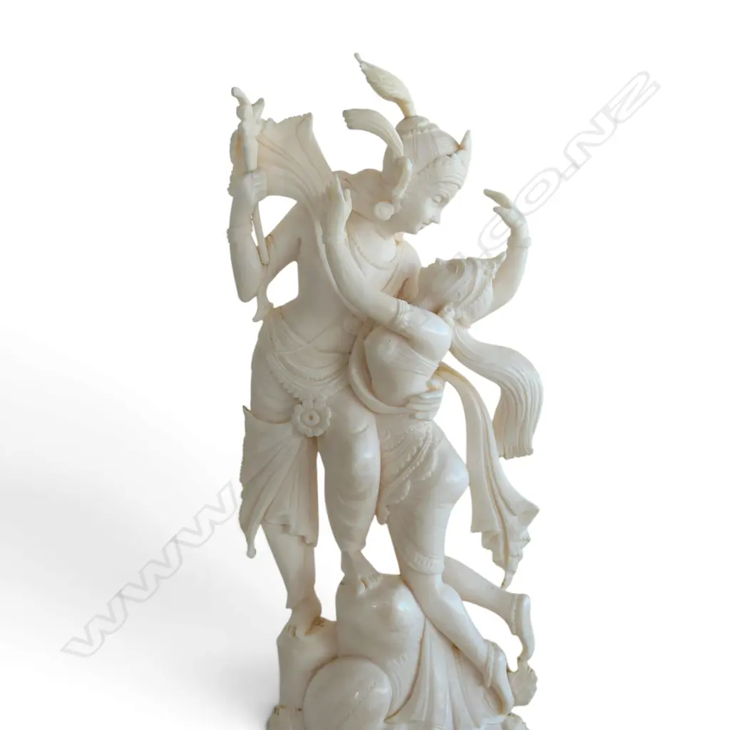 FINE VINTAGE INDIAN CARVED IVORY GROUP OF KRISHNA & RAHDA in an embrace. On wood stand. H.220mm. Image 1++