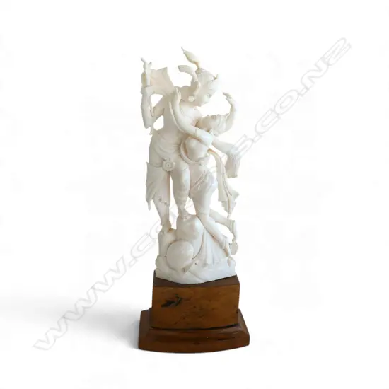 FINE VINTAGE INDIAN CARVED IVORY GROUP OF KRISHNA & RAHDA in an embrace. On wood stand. H.220mm.