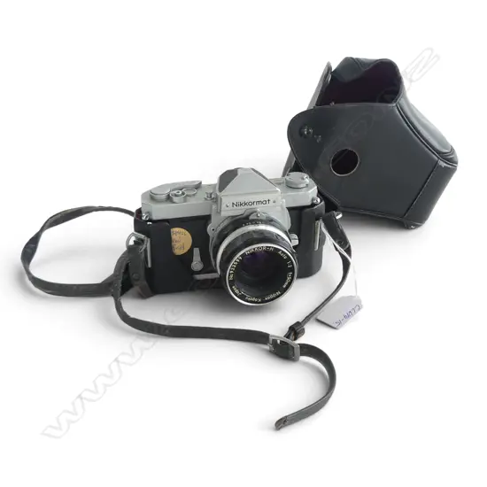 NIKKORMAT CAMERA 50mm MACRO LENS. With new battery. Working