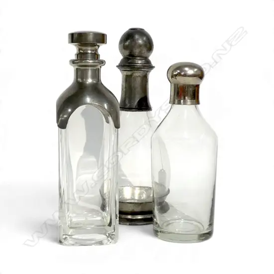 VINTAGE FRENCH DECANTER BY LES ÉTAINS DU MANOIR AND TWO FURTHER ROUNDED DECANTERS, ONE WITH PEWTER COLLAR