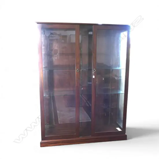 LGE MAHOGANY DISPLAY CABINET. 2 full length glazed doors 4 glass adjustable shelves. 1410 x 440 x 1875mm.