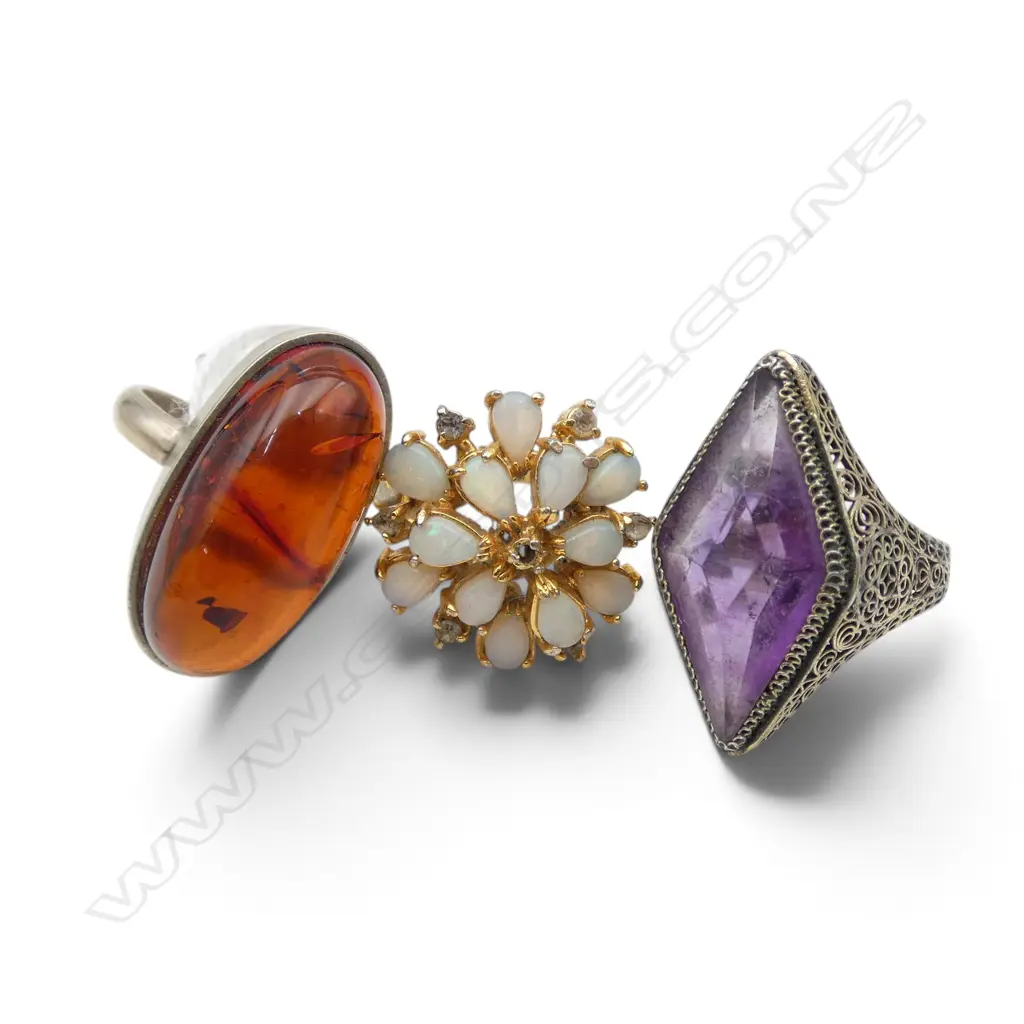 3 COSTUME RINGS (1 AMBER?) Image 1++