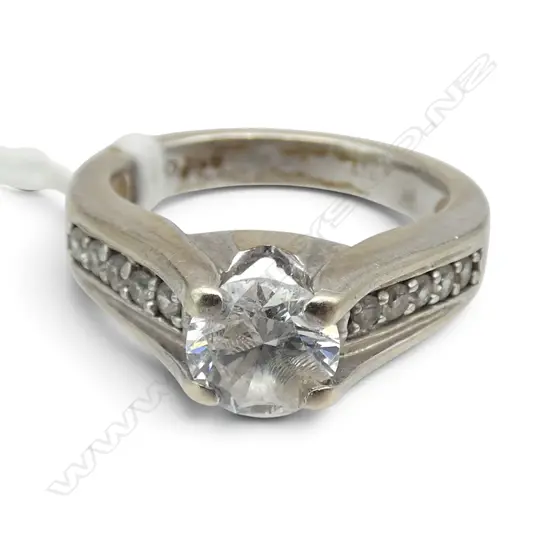 9CT WG & CZ RING 6.2gms CENTRE STONE DAMAGED SIZE N