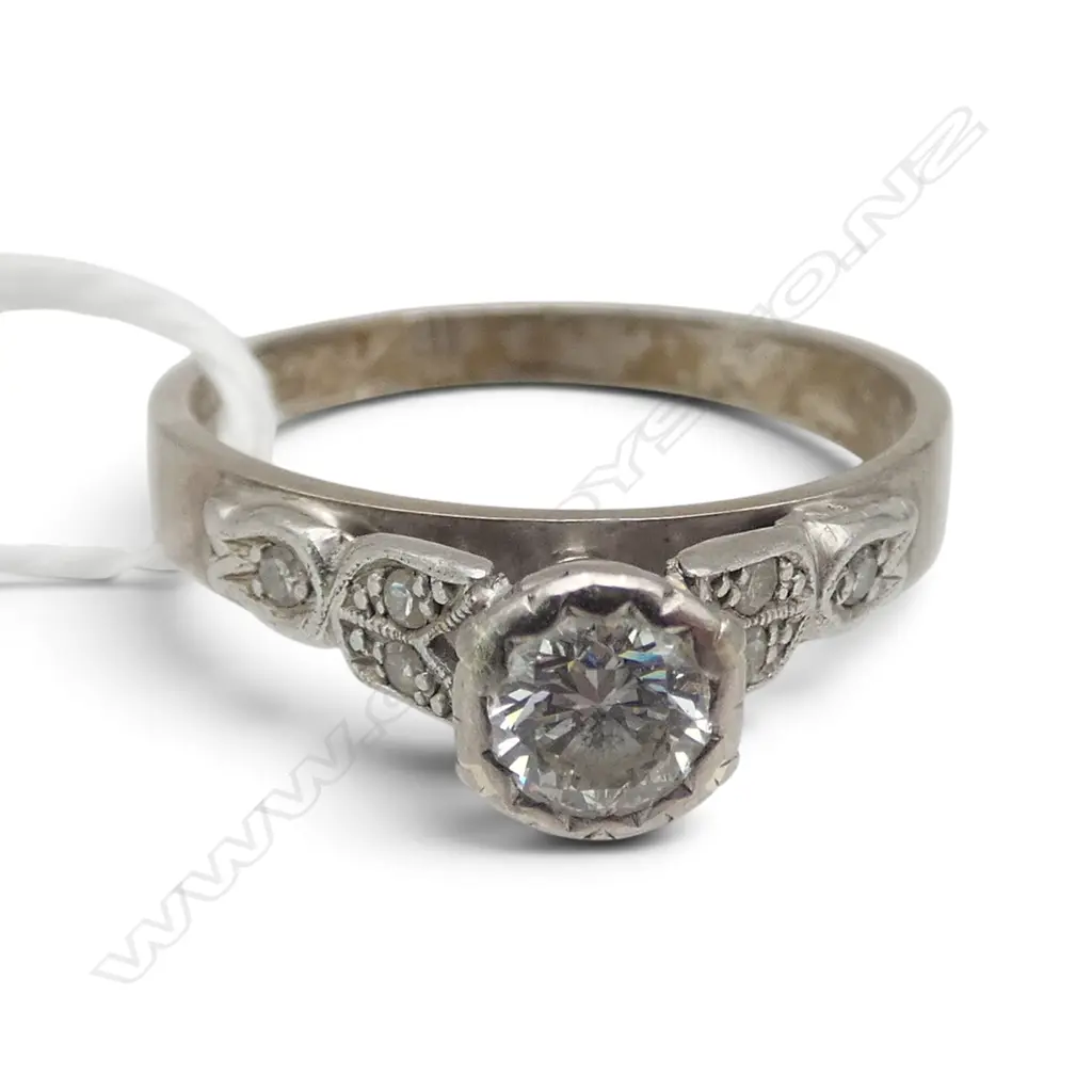 18CT WG & SOLITAIRE DIAMOND RING with shoulder diamonds 4gms SIZE P (Estimated diamond size 0.40ct) Image 1++