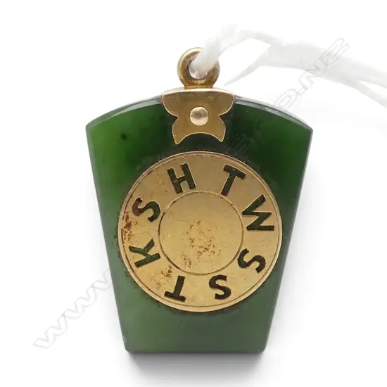 An old Masonic 15ct gold and greenstone pendant of tablet form, the front set with 15ct disc. Small chip back corner