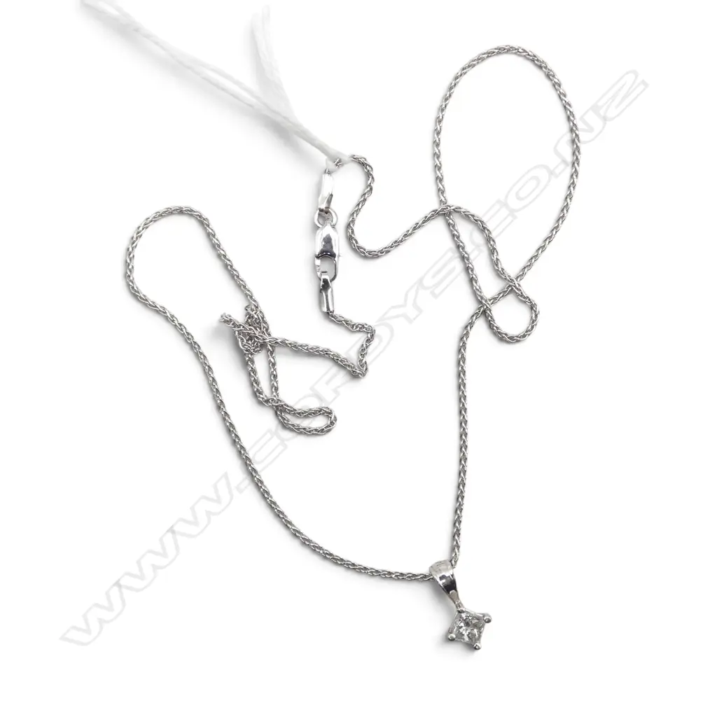 14CT WHITE GOLD AND DIAMOND PENDANT (0.55gms) 9CT WHITE GOLD CHAIN (2.10gms) Image 1++