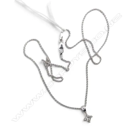 14CT WHITE GOLD AND DIAMOND PENDANT (0.55gms) 9CT WHITE GOLD CHAIN (2.10gms)