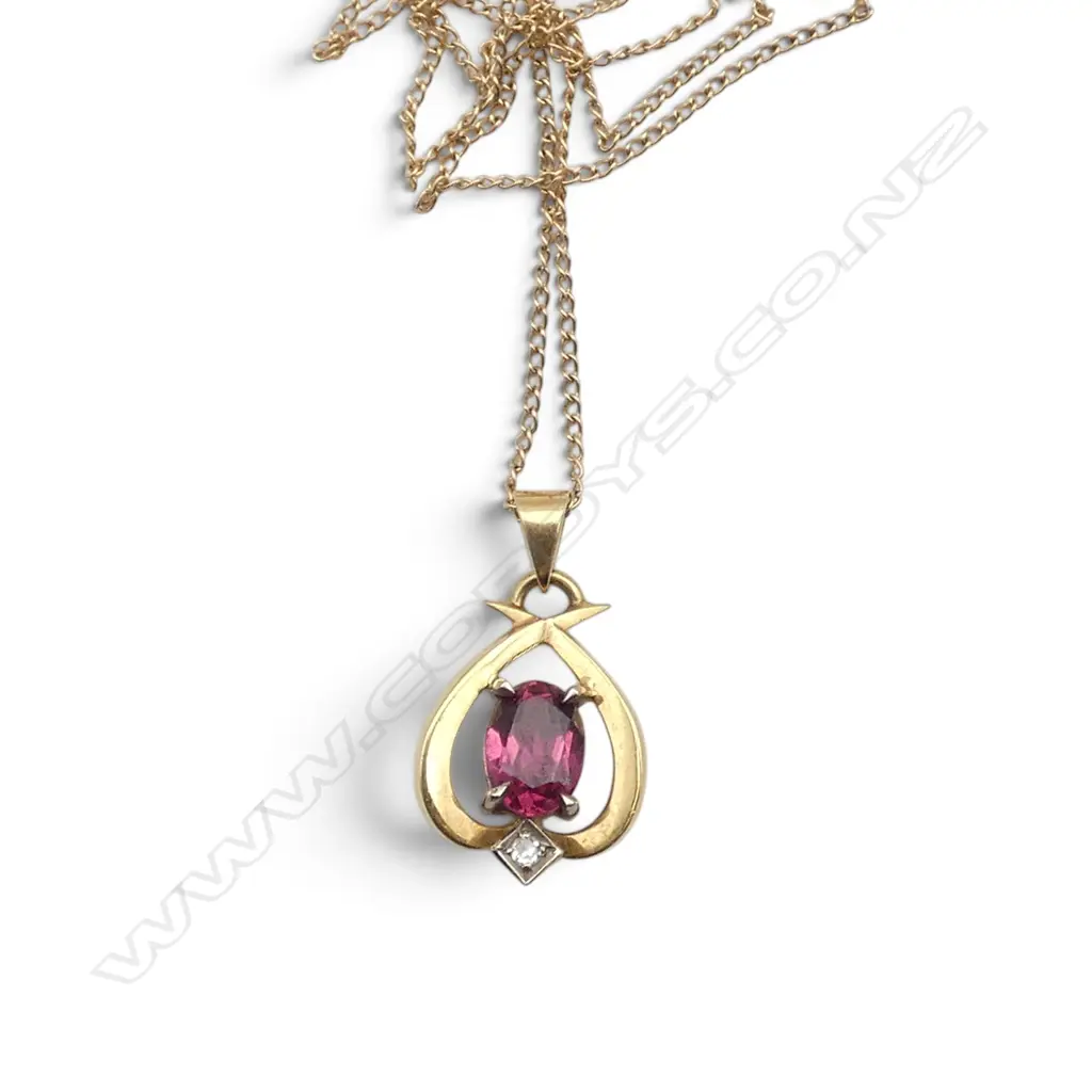 10CT GOLD CHAIN 1GM WITH 18CT GOLD PINK TOURMALINE & DIAMOND PENDANT TOTAL WIEGHT 2GMS Image 1++
