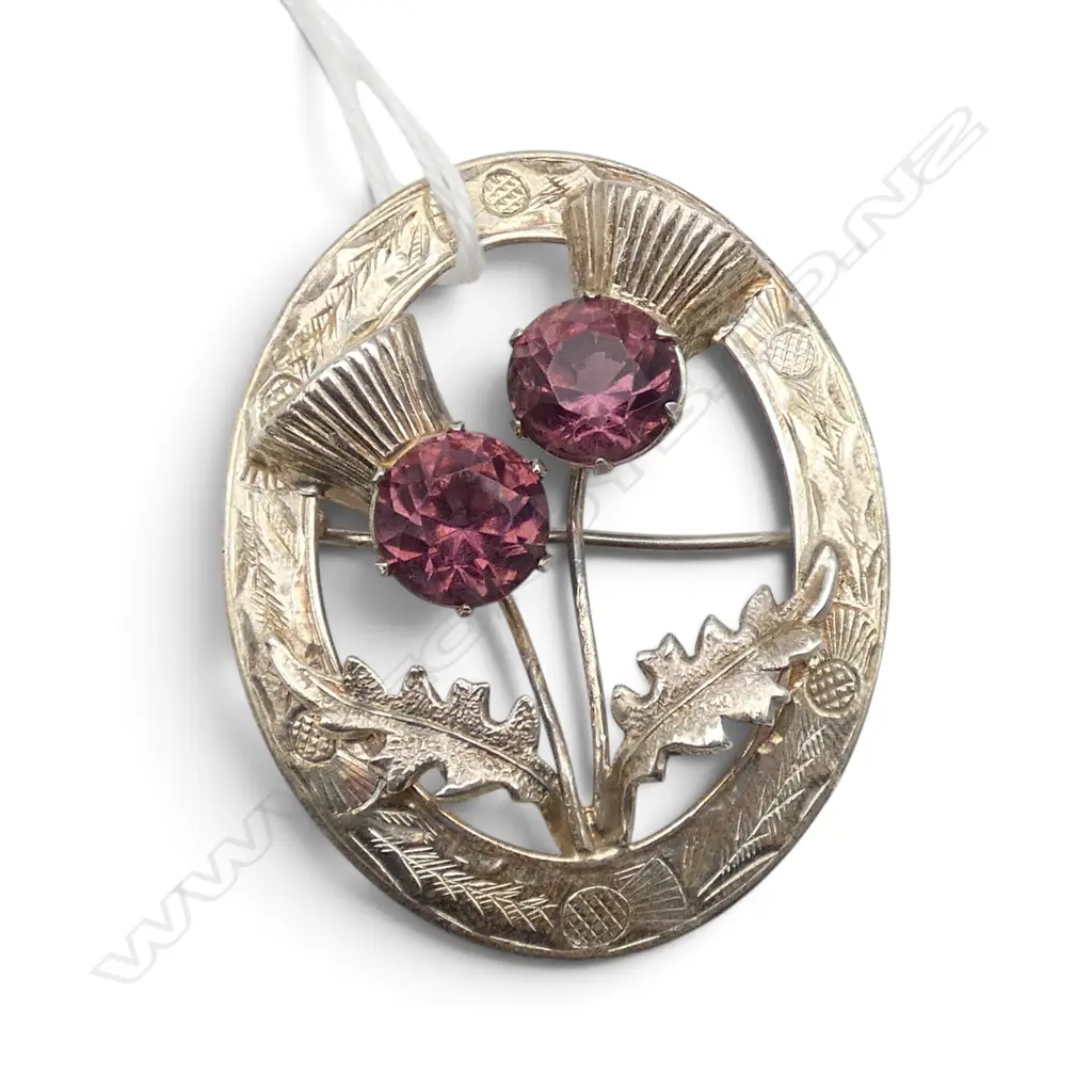 EARLY 20thC SILVER PLATE SCOTTISH THISTLE BROOCH w 2 purple stones. Engraved decoration Image 1++