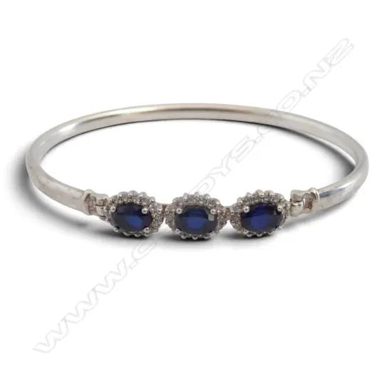 STG SIL BANGLE  with CREATED BLUE SAPPHIRE & CZ STONES 9.7gms