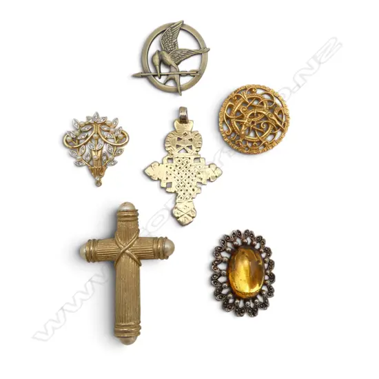FIVE COSTUME BROOCHES AND AN ETHIOPIAN CROSS