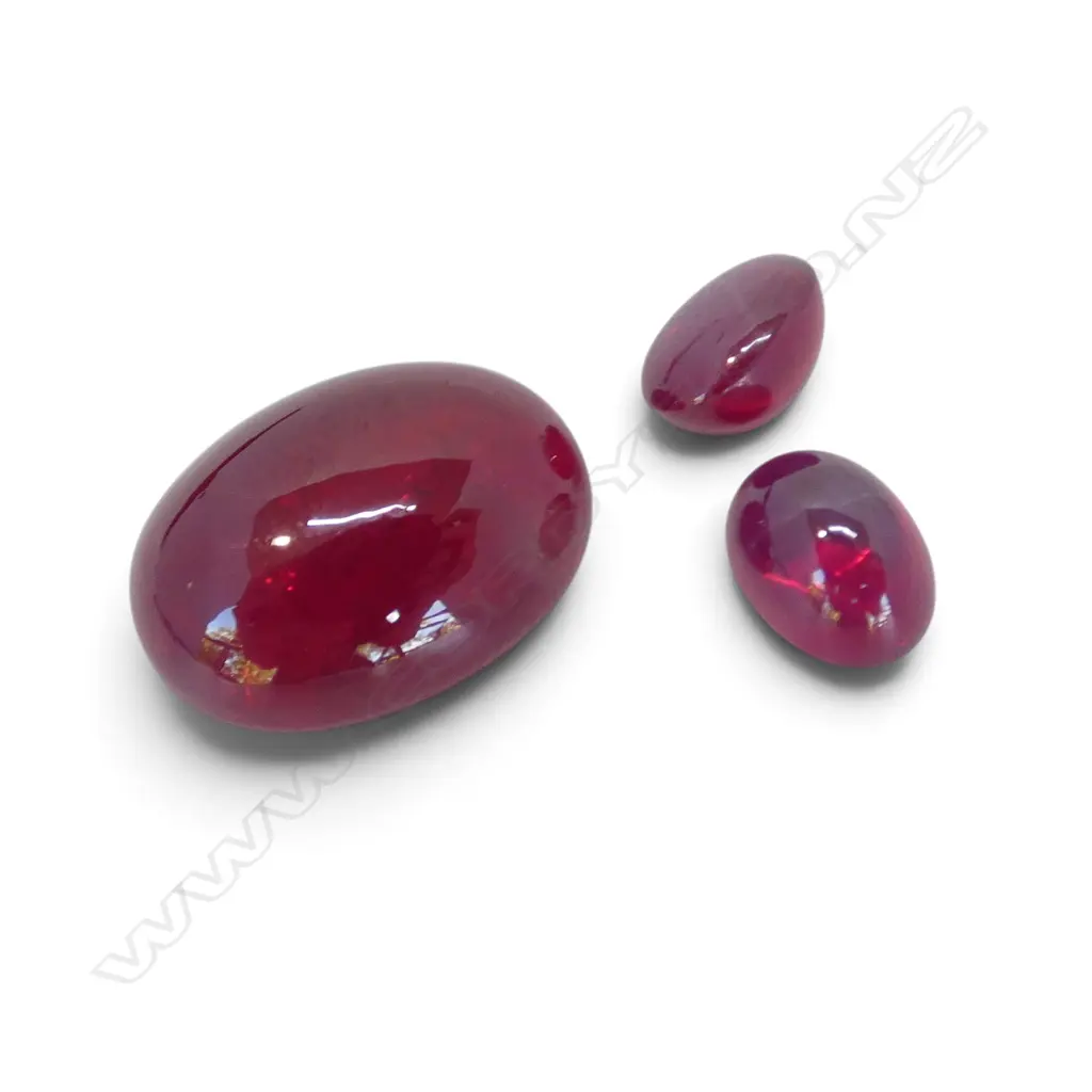 SYNTHETIC RUBY SET;  LRG 10.3ct CABOCHON & PR SML STAR RUBY CABOCHONS Image 1++