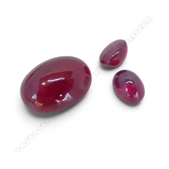SYNTHETIC RUBY SET;  LRG 10.3ct CABOCHON & PR SML STAR RUBY CABOCHONS