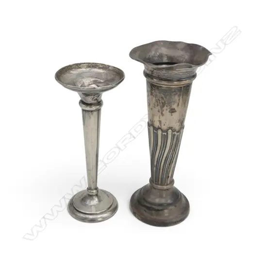 Tall vase with partially weighted base and dented at top. Shorter vase with plaster weighted base