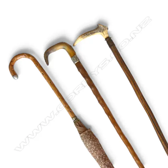 3 WALKING STICKS; 2 w. HORN HANDLES, 1 AN UMBRELLA L.950mm