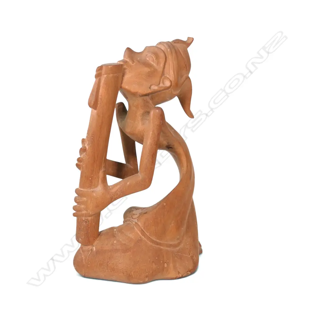 VINTAGE HAND CARVED BALINESE SCULPTURE OF A MUSICIAN PLAYING THE FLUTE, 230 X 155MM Image 1++