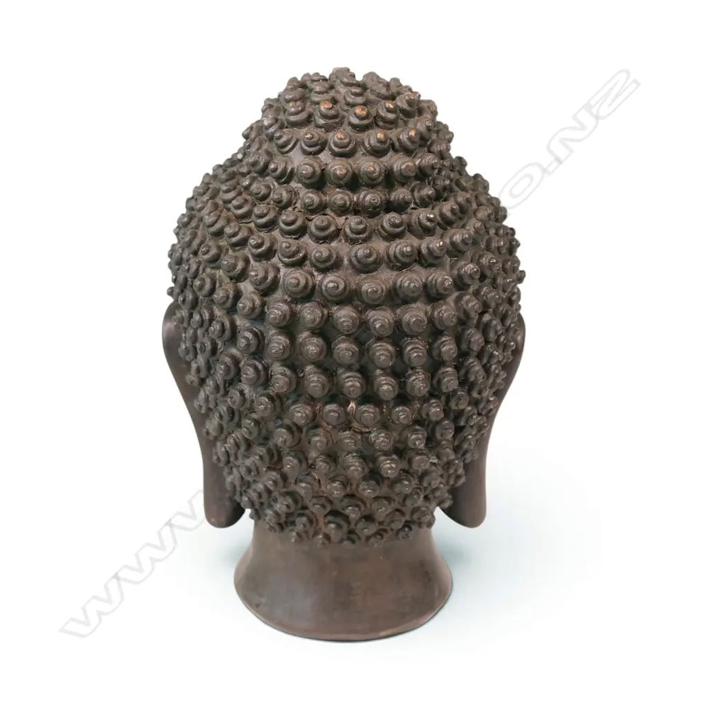 SOUTH ASIAN STYLE HEAVY BRONZED BUDDHA HEAD SCULPTURE WITH A SMALL CORAL TONE URNA, GOLDEN HIGHLIGHTS, H. 170 X 70MM Image 1++