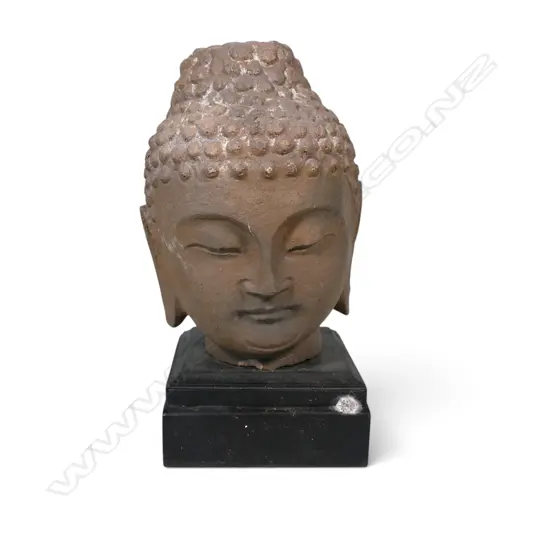 MONTED STYLIZED HAND CARVED PINK CEMENT BUDDHA HEAD, CHIP IN FRONT. H.160MM
