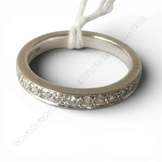 18CT WHITE GOLD AND DIAMOND BAND 5gms SIZE O