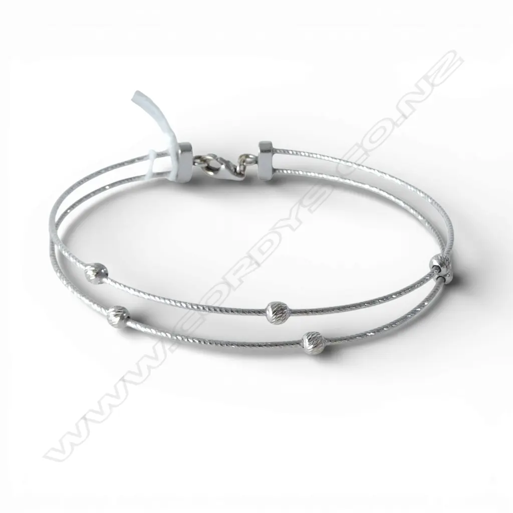 18ct WHITE GOLD DBLE BAND BANGLE marked 750 Italy. 5.4gms Image 1++
