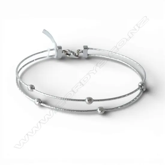 18ct WHITE GOLD DBLE BAND BANGLE marked 750 Italy. 5.4gms