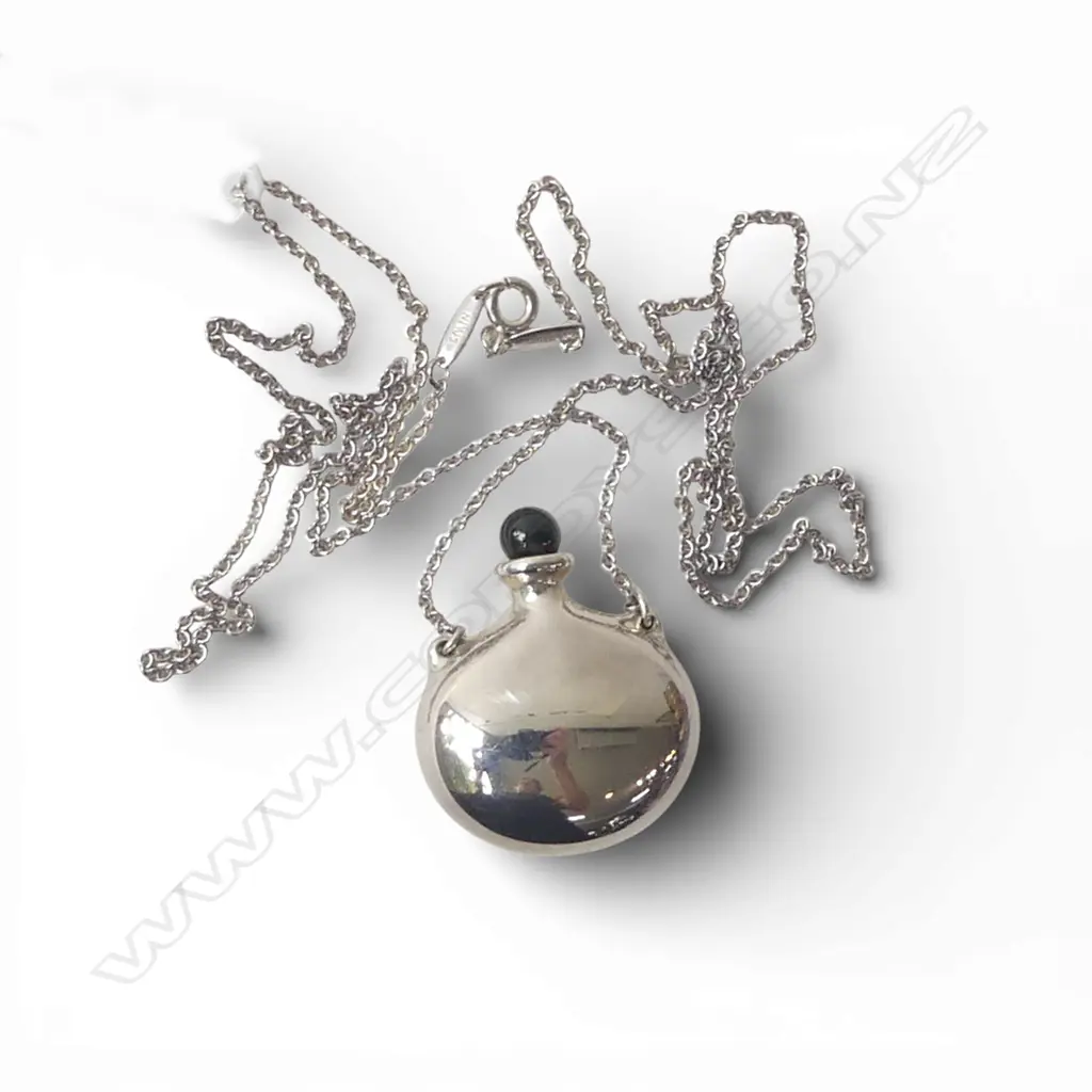 SILVER TIFFANY & CO PERFUME FLASK on SILVER CHAIN, both stamped Tiffany & co, SPAIN, and flask signed Elsa Peretti, case Image 1++