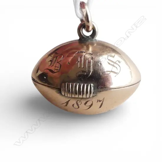 Rare 9ct ROSE GOLD RUGBY BALL fob medallion prize to 'G.C. Martin 7 Aside B.H.S 1897' 3.65gms