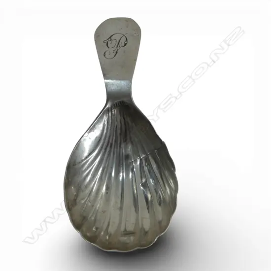 A George III silver tea caddy spoon scallop form bowl. London 1880 by Solomon Houghman 8.60gms repair to scallop shell bowl