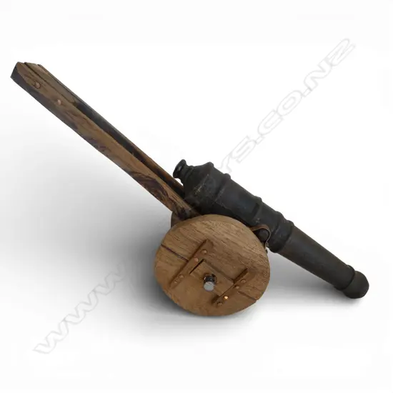 CAST IRON MODEL CANNON on handbuilt wooden base, L.335mm