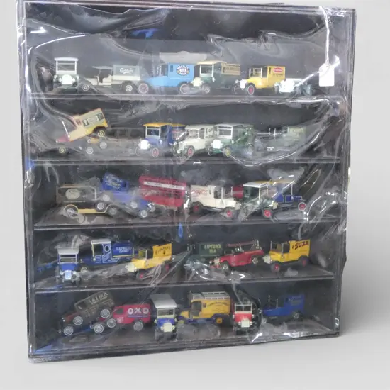 30 VINTAGE TRUCKS (MODELS OF YESTERYEAR) IN DISPLAY SHELVES 550x520mm