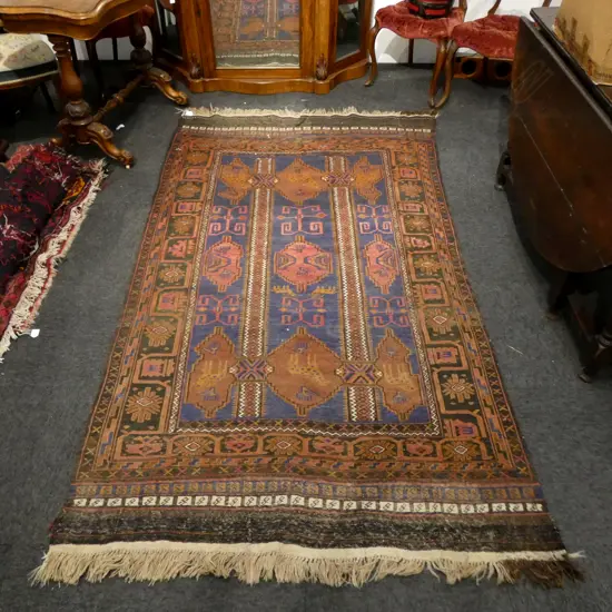 Persian multi medallion hand knotted rug blue ground 2380 x 1320mm