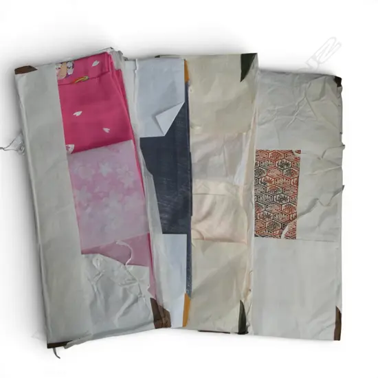 FOUR VINTAGE KIMONO IN ORIGINAL PACKAGING