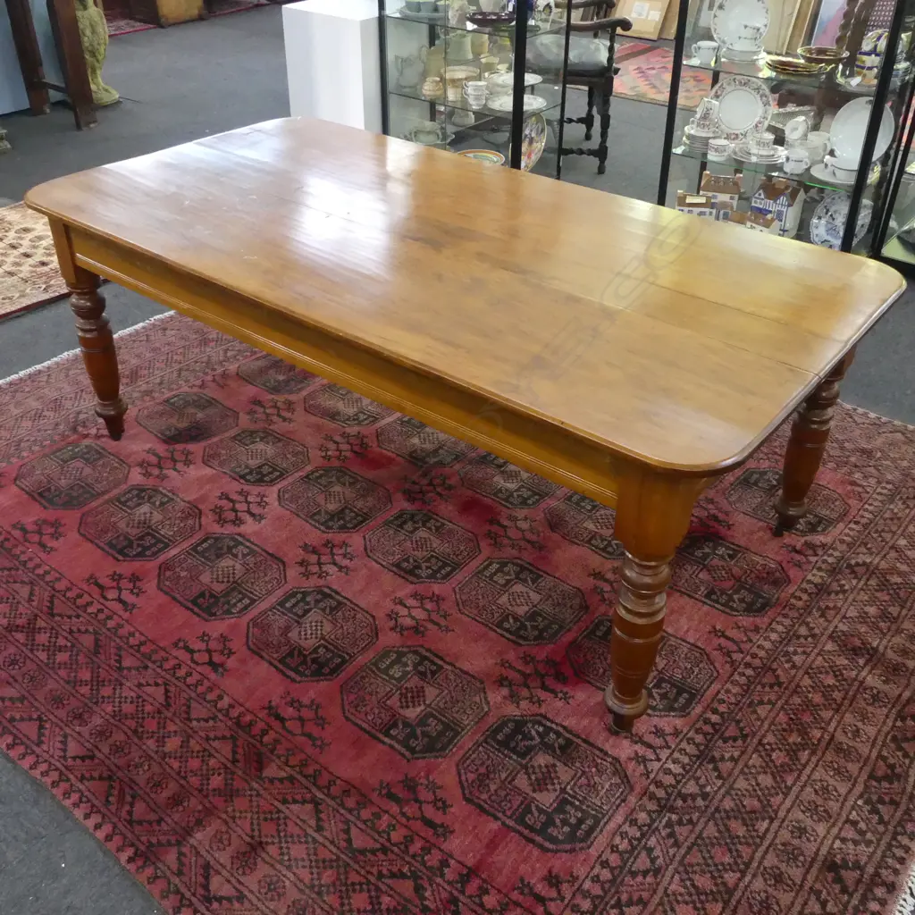 COLONIAL KAURI DINING TABLE ON CASTORS 1970x1030x750mm Image 1++