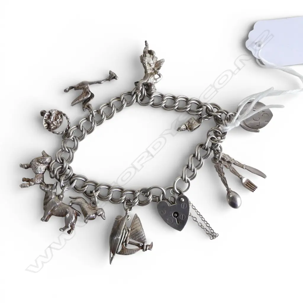 SILVER CHARM BRACELET poodle + corgi + sailboat + Scottish dancer + stork flying with baby etc 36gms Image 1++