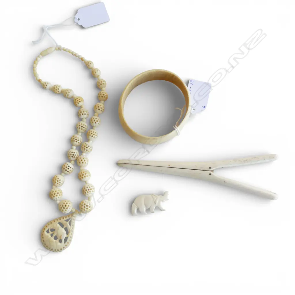 IVORY BRACELET PLUS THREE BONE ITEMS, ELEPHANT BROOCH, CARVED NECKLACE, GLOVE STRETCHERS Image 1++