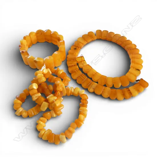 TWO AMBER NECKLACES & A BRACELET From the estate of jeweller Simon Misdale`