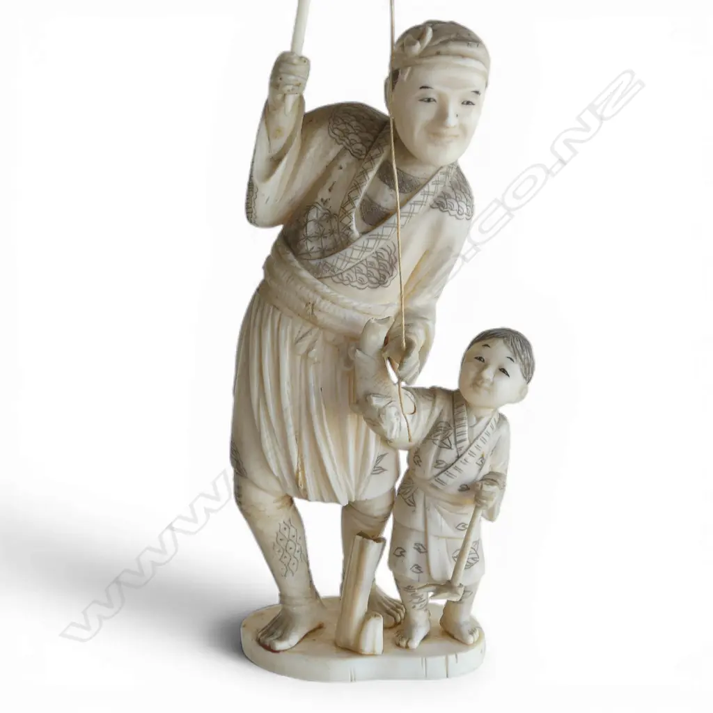 EARLY 20thC CHINESE CARVED IVORY FISHERMAN with his son. Holding pole high. H.275mm to top of pole Image 1++