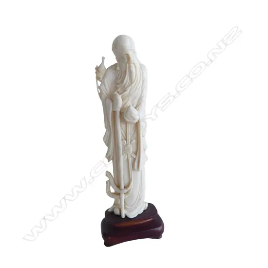 OLD MARINE IVORY CHINESESTANDING DEITY FIGURE with peach minor faults on wood base  H.180mm